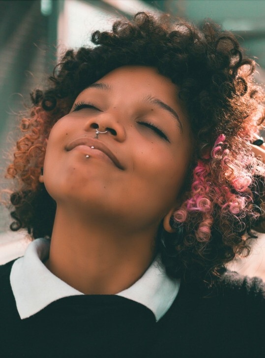 Curly hair with rose gold