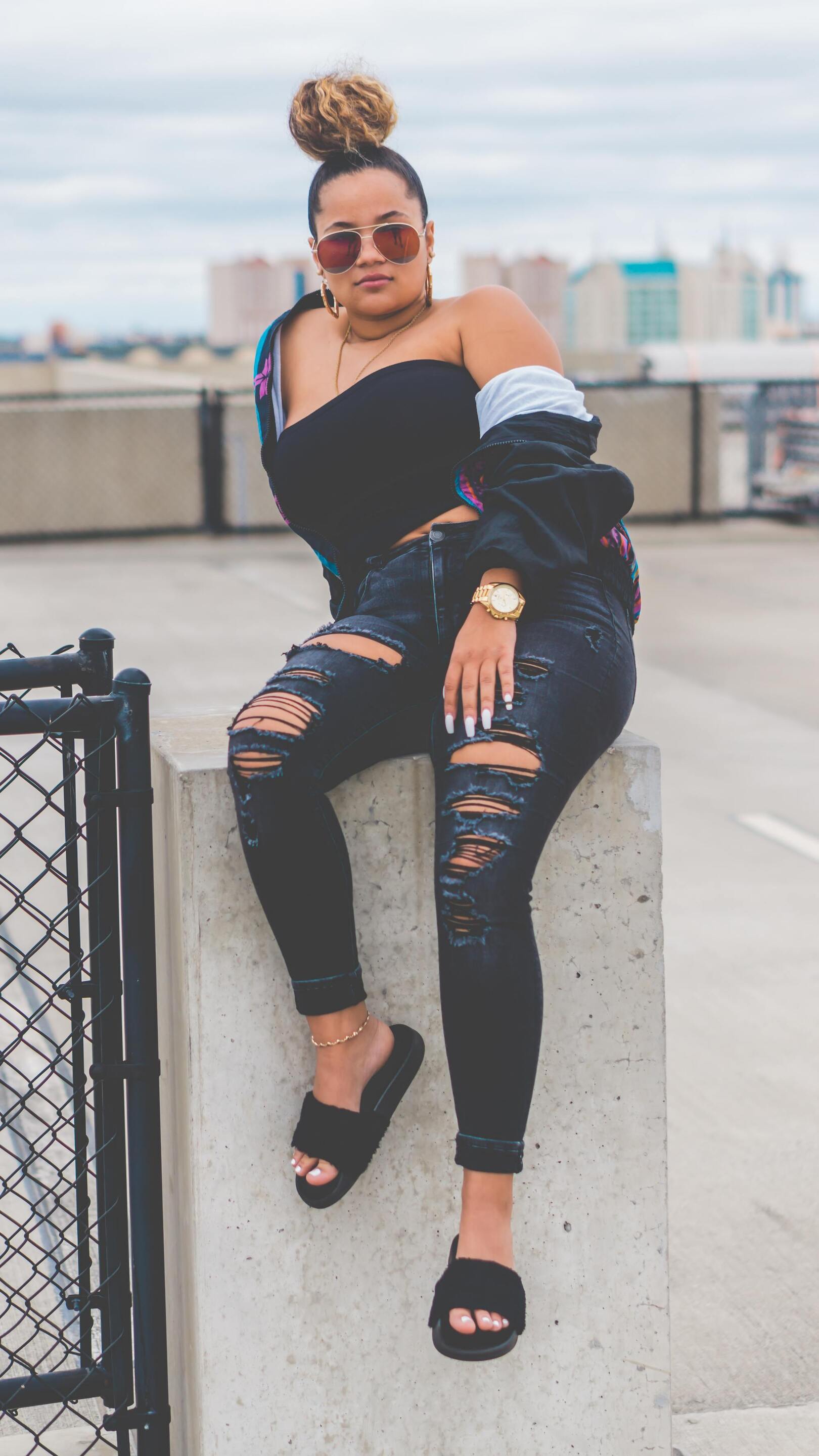 Woman wearing a sleek bun quick hairstyle
