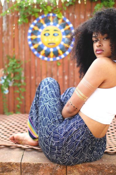 woman with long natural curly hair 4A curls