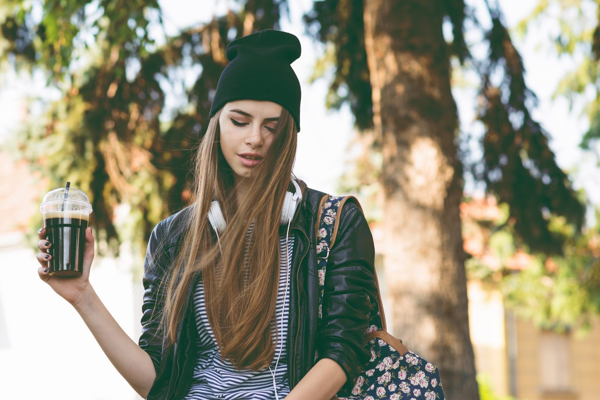 woman with beanie and long greasy hair