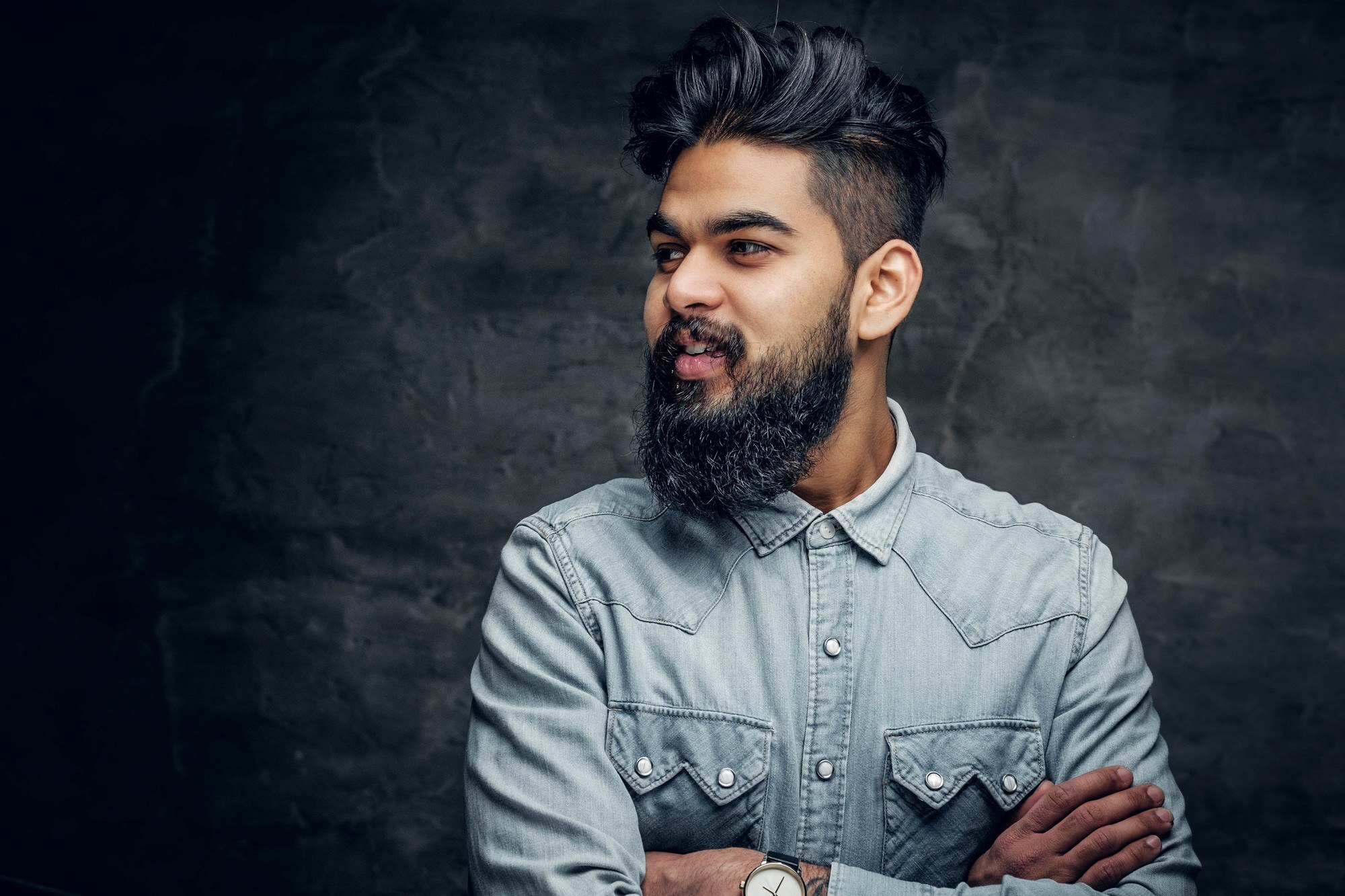 man with a full beard and undercut
