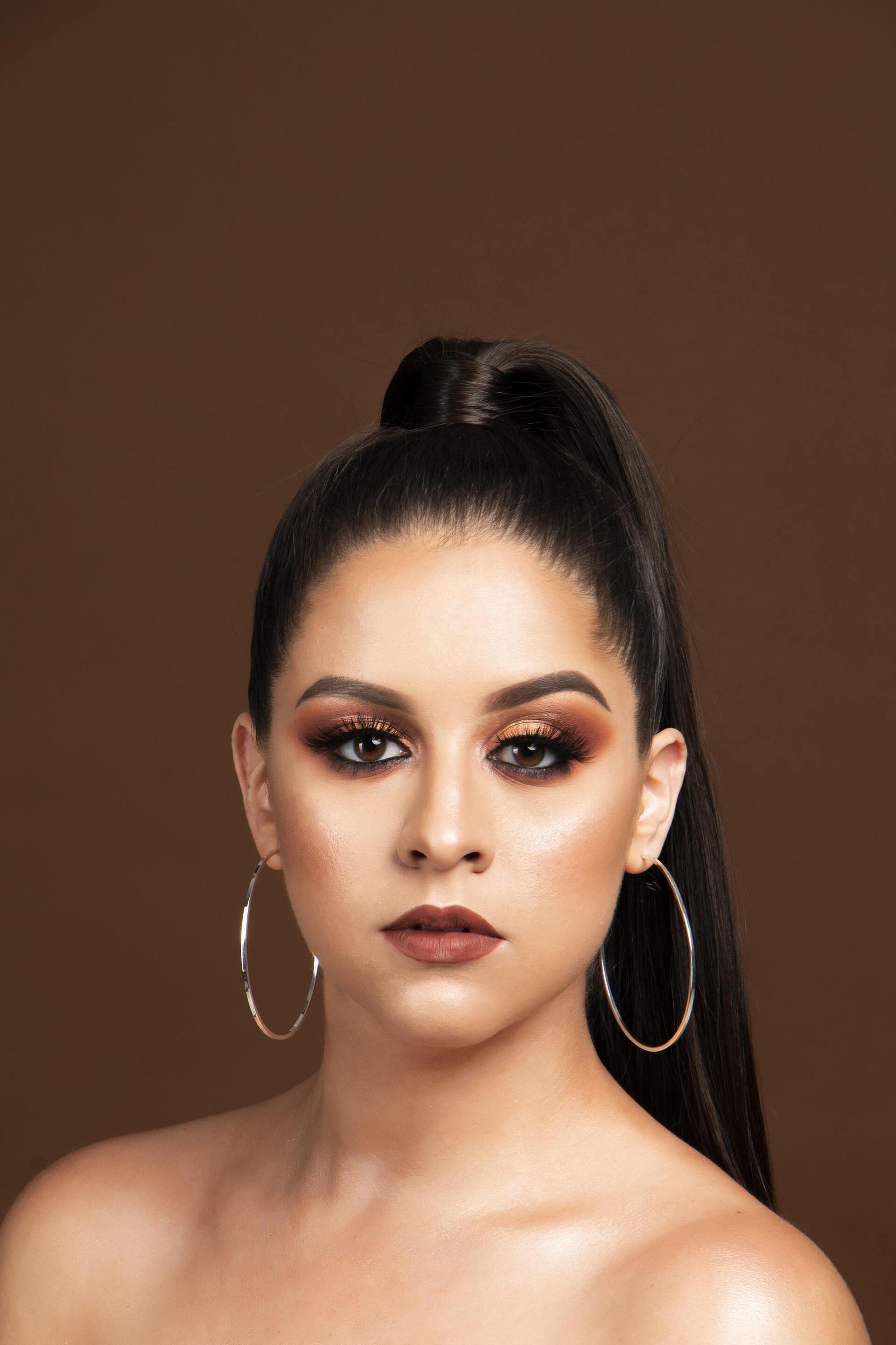 Woman with a sleek high ponytail for University