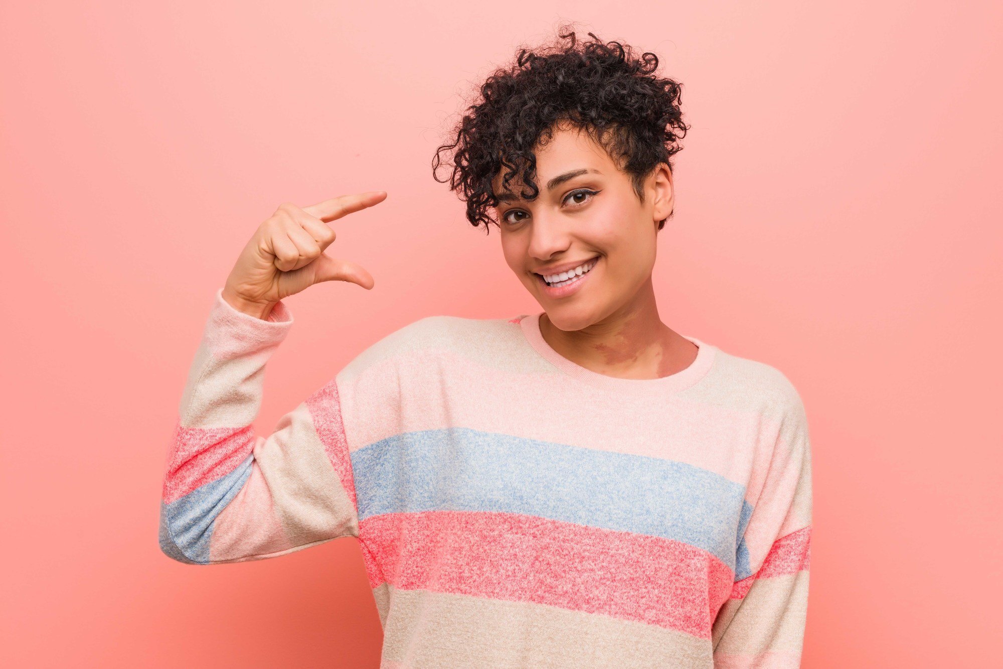 woman with short curly pixie cut hairstyle