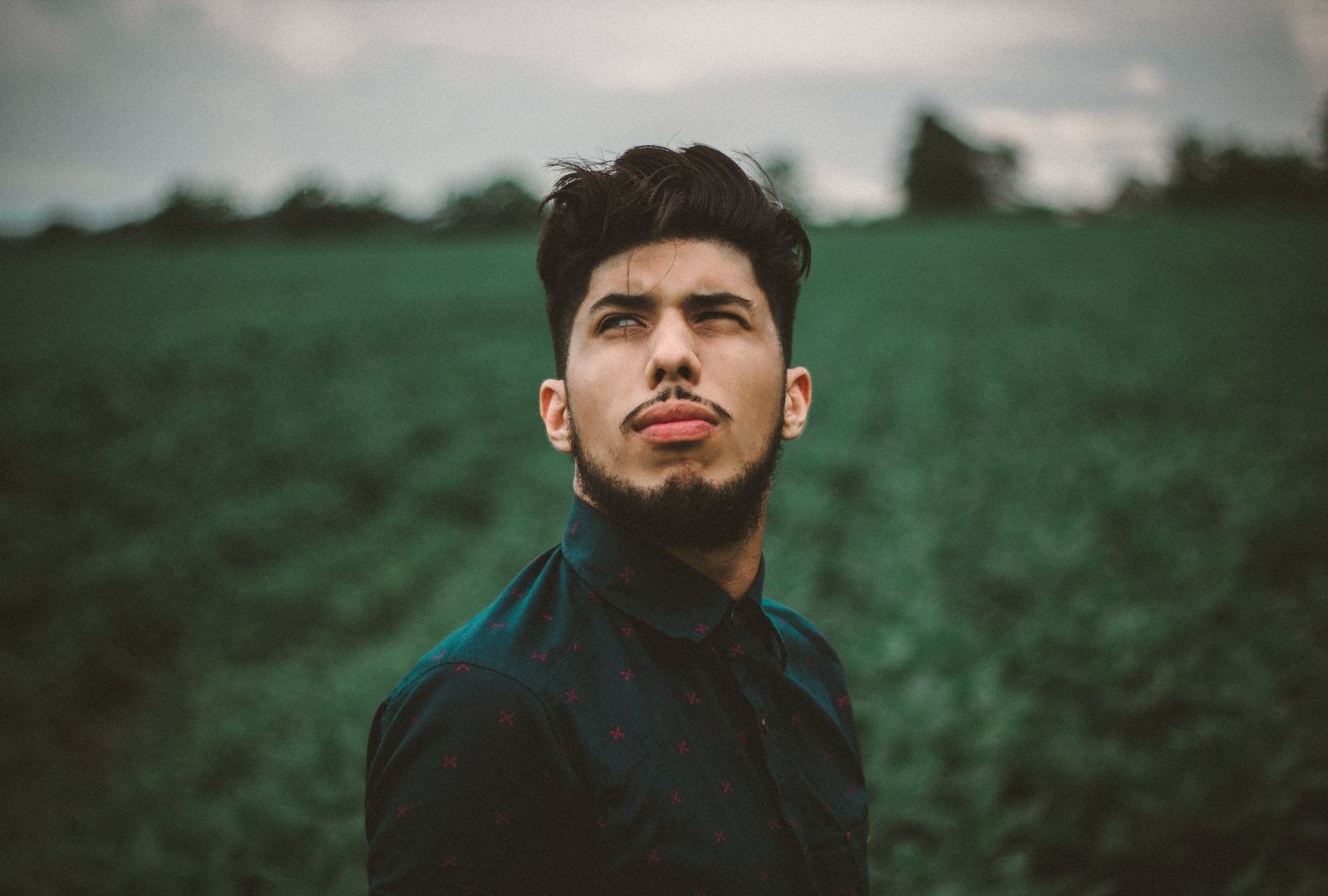 Movember: man with short black hair and beard