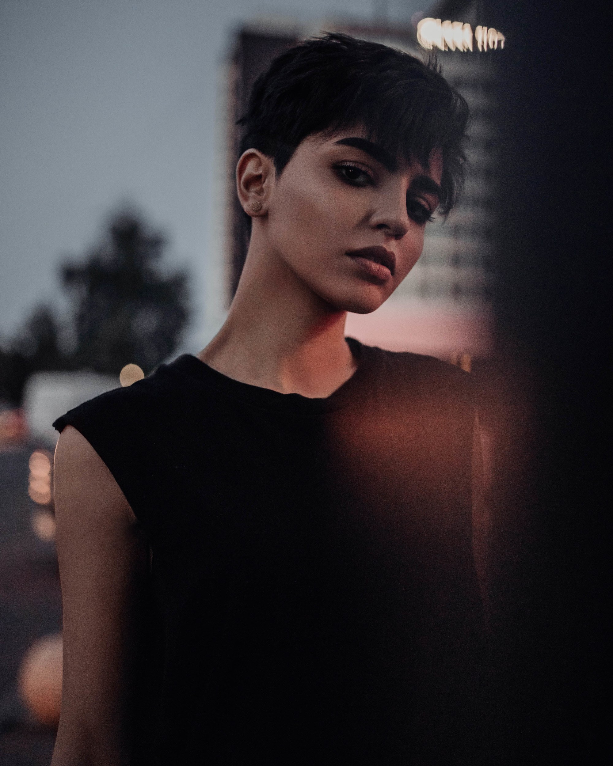 very short hairstyles: woman with a pixie cut