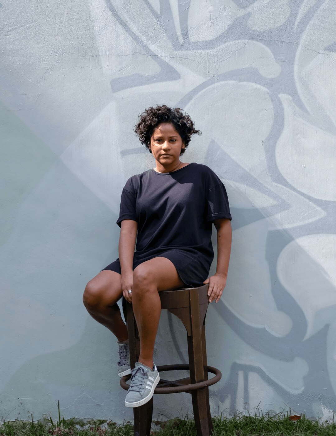 woman with short, tapered curly hairstyle