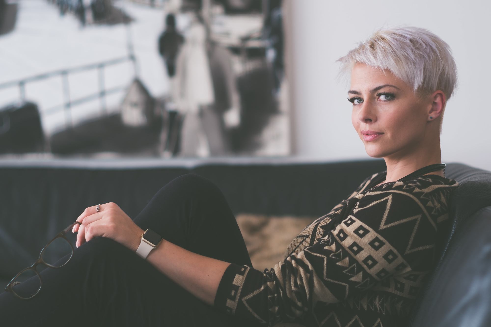 very short hairstyles: woman with short platinum blonde pixie haircut