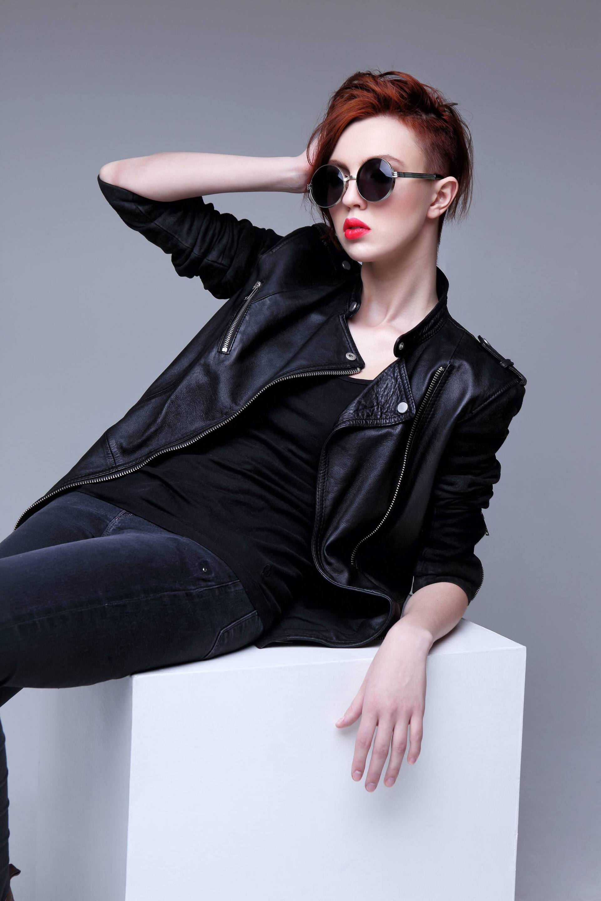 woman with short red hair undercut pixie hairstyle