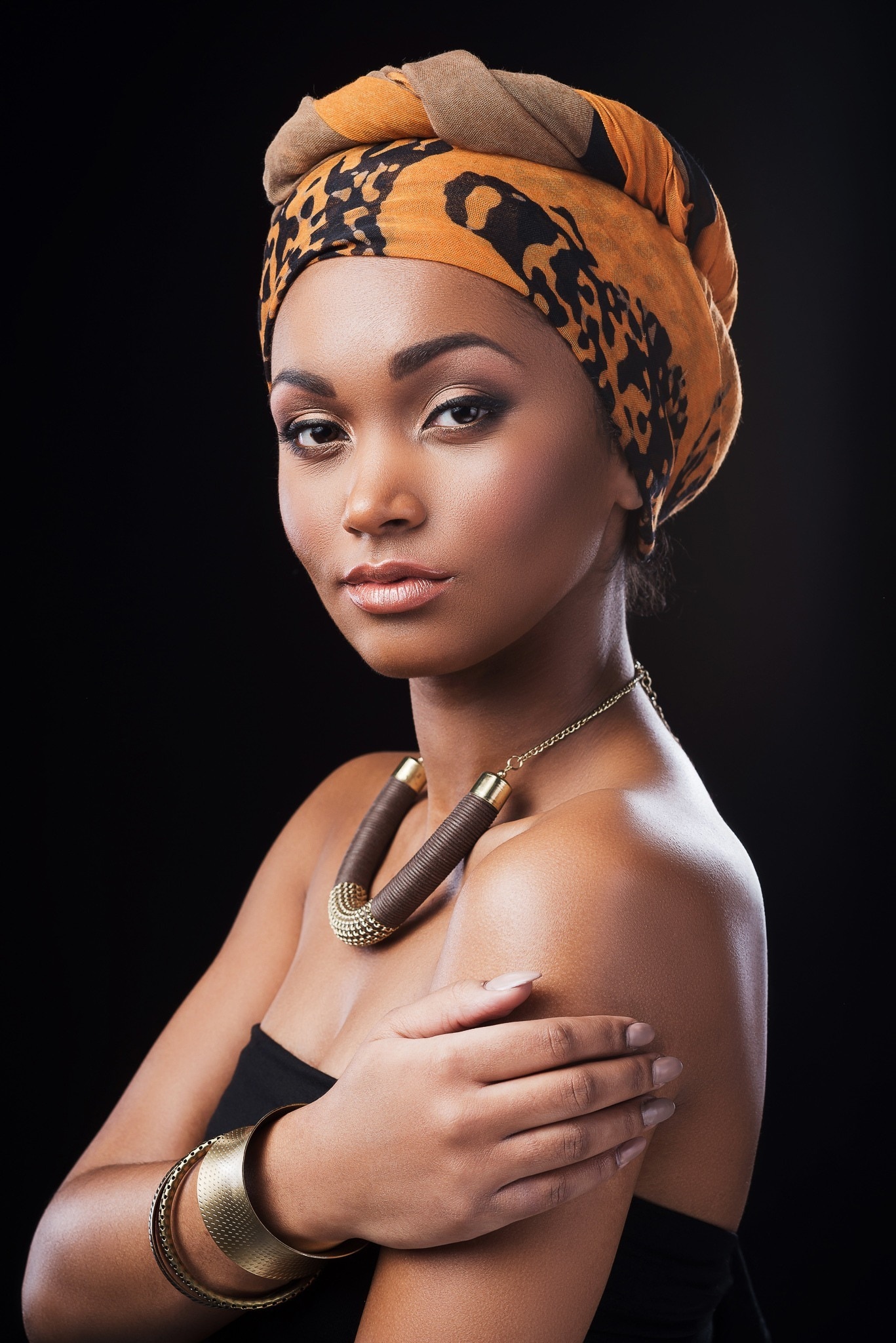 headscarf: woman wearing a twisted crown headscarf style