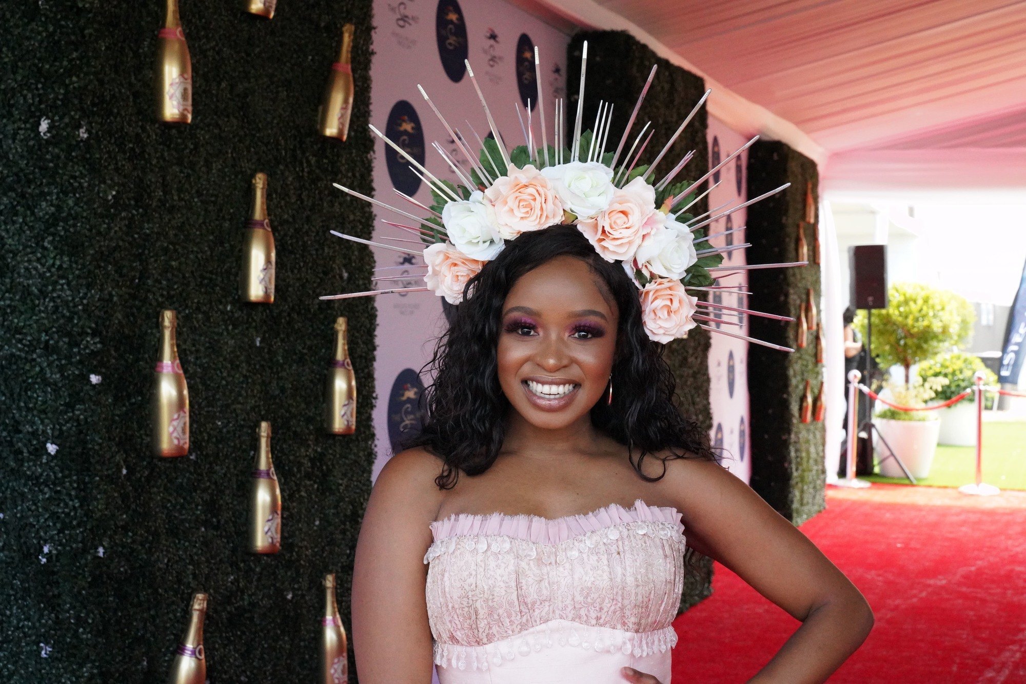 woman at the sun met 2020 with a flower crown and accessory hairstyle