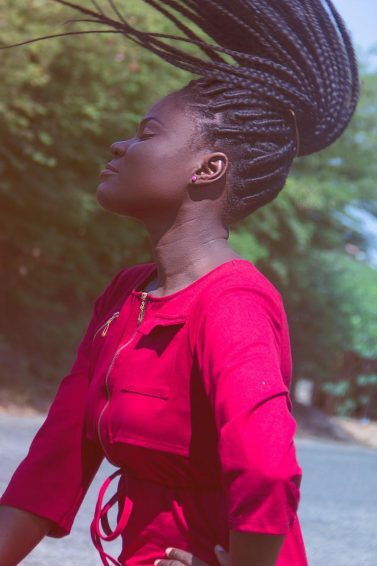 woman wearing a protective braids for windy weather