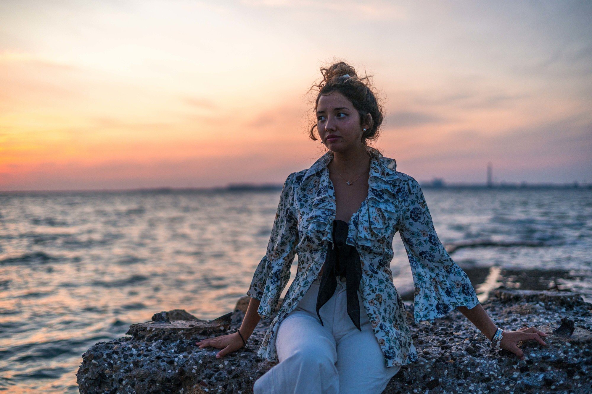 Woman wearing a wispy windy weather hairstyle