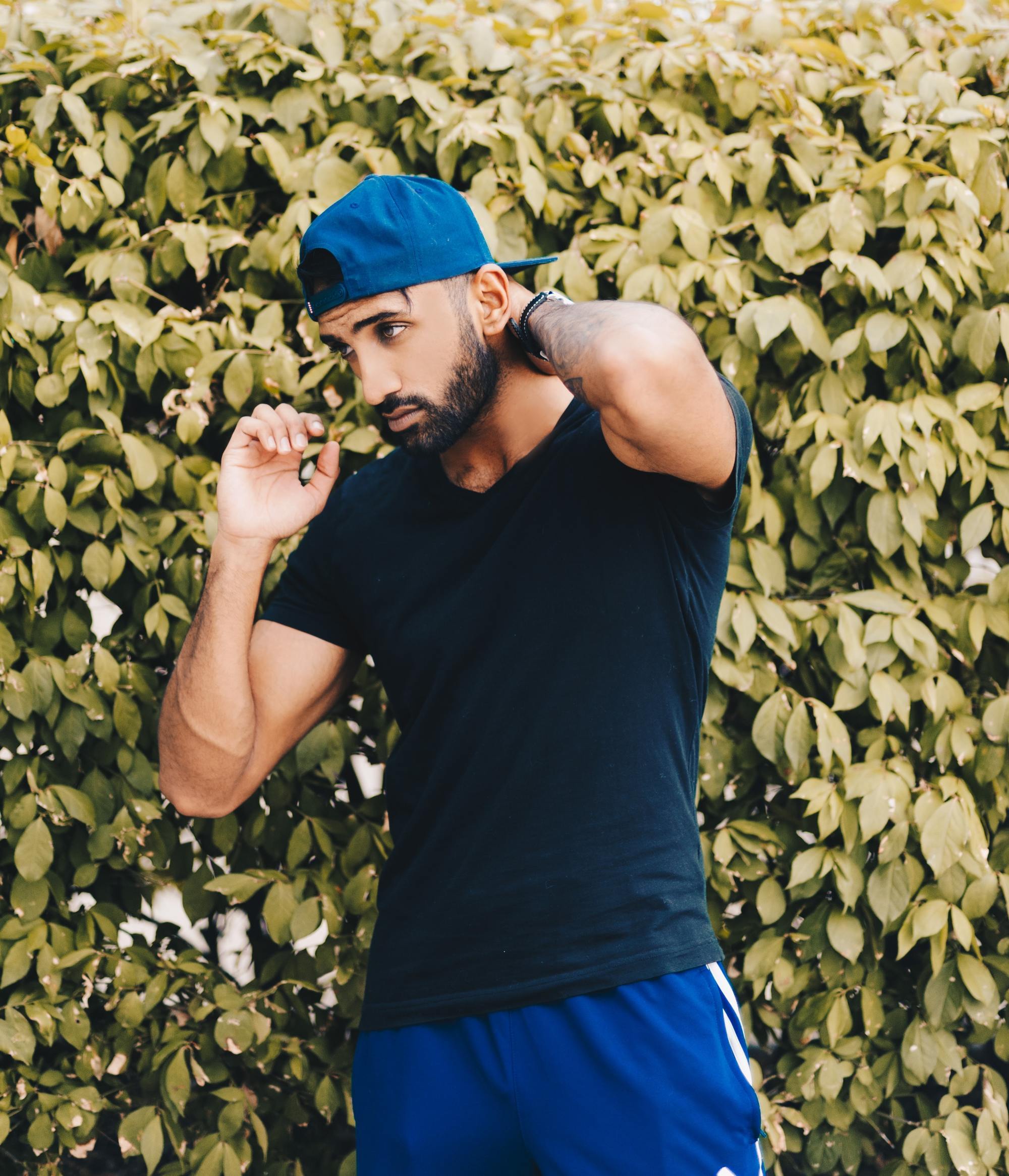 man wearing a blue cap