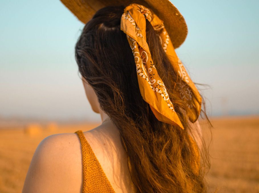 Half up hairstyle with scarf accessory