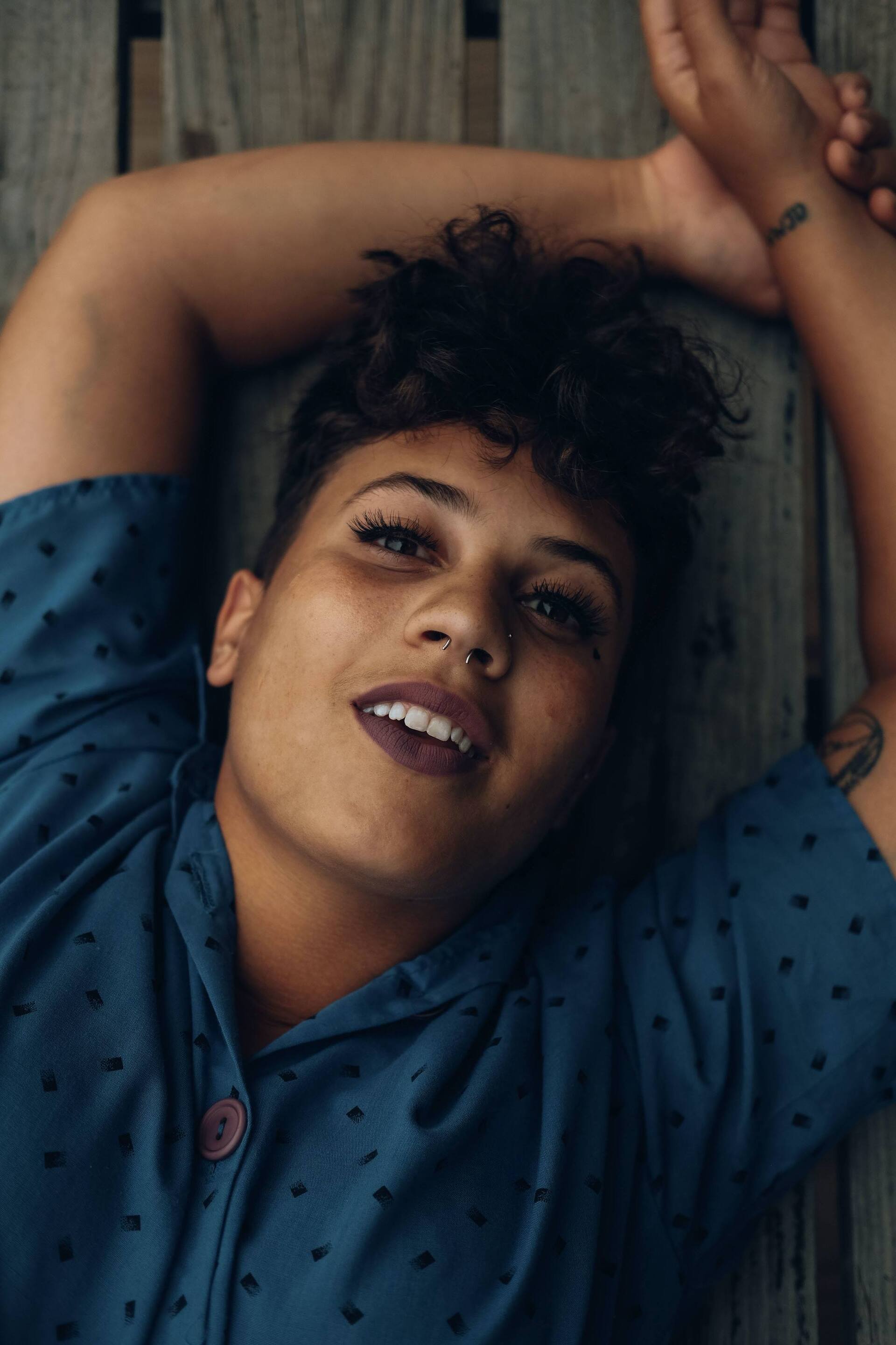 woman with short curly hair