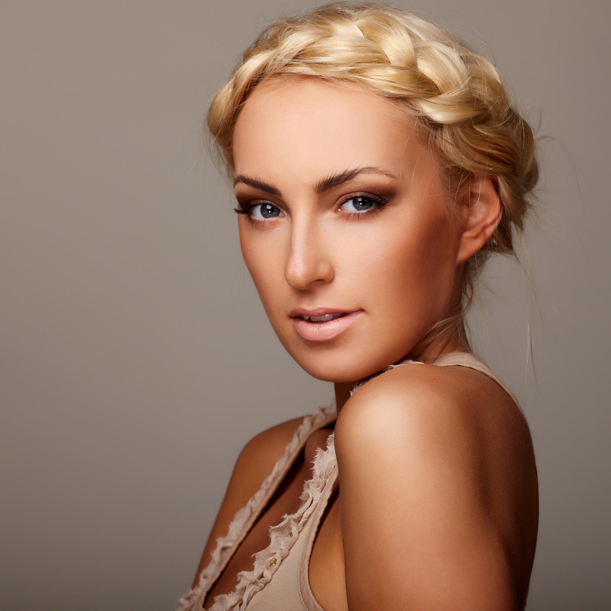 hide your roots without dyeing your hair: woman with a crown braid