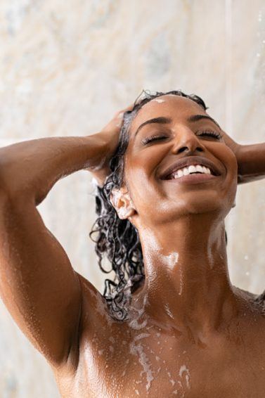 woman washing her hair; hair washing routine