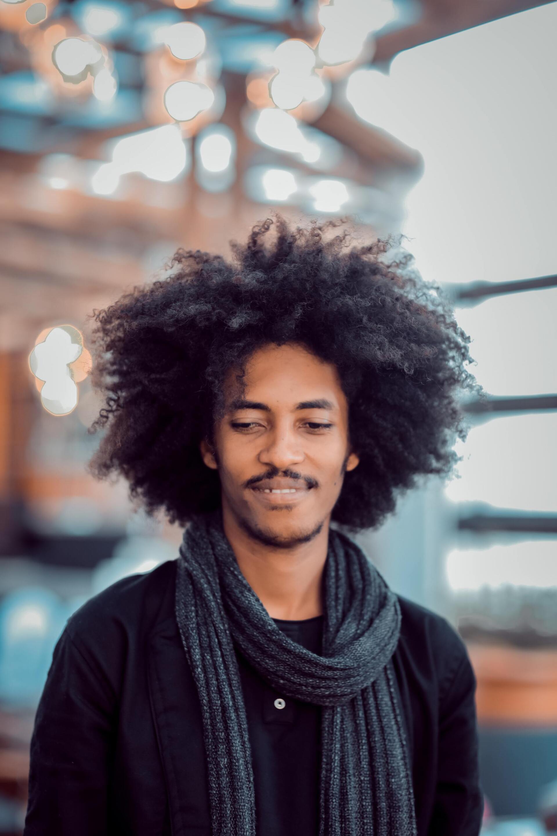 man with large afro