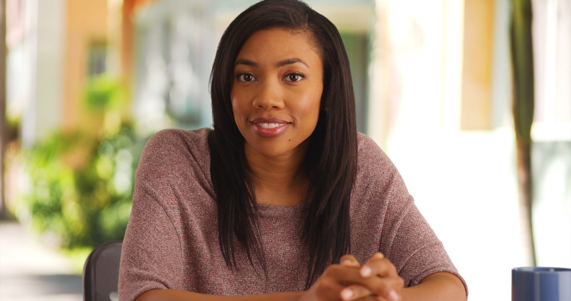 keratin smoothing treatments: woman with medium length straight hair