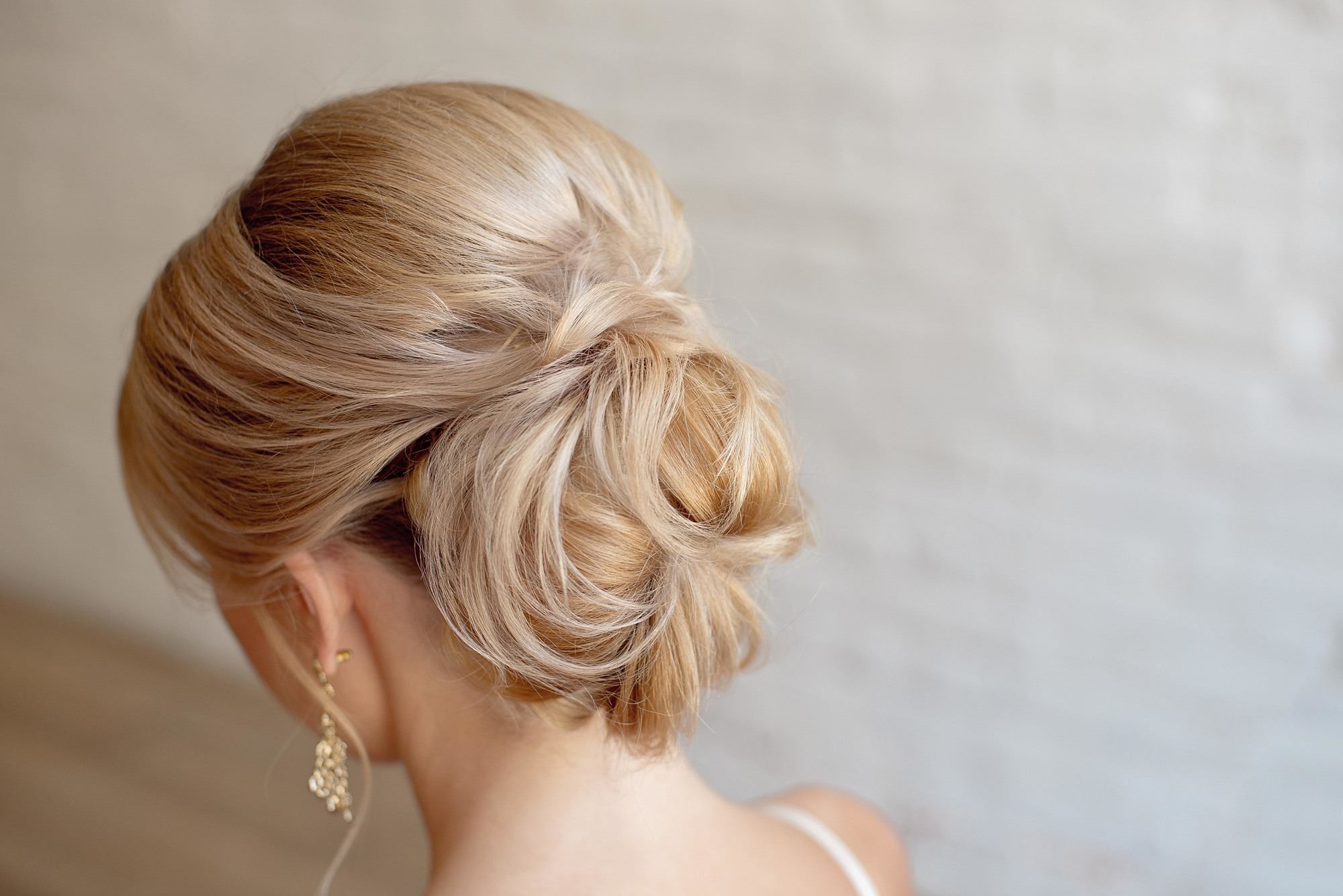 woman with blonde hair wearing a soft updo