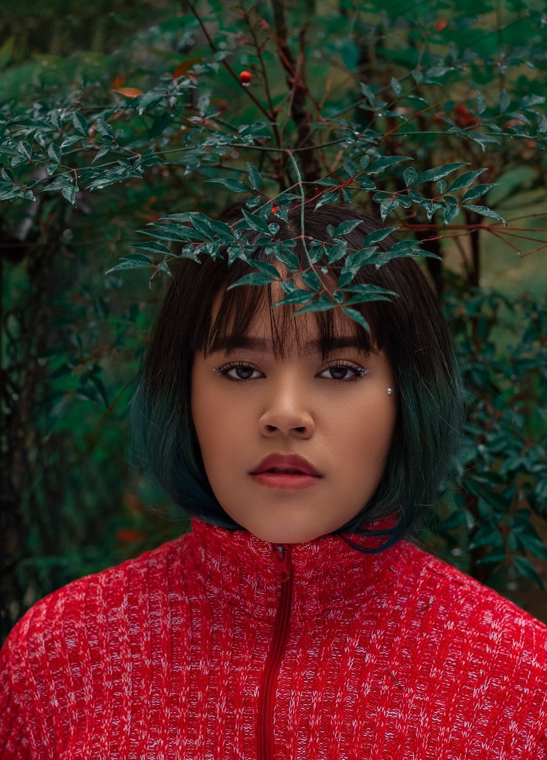 woman with a straight bob hairstyle with a sparse, wispy fringe