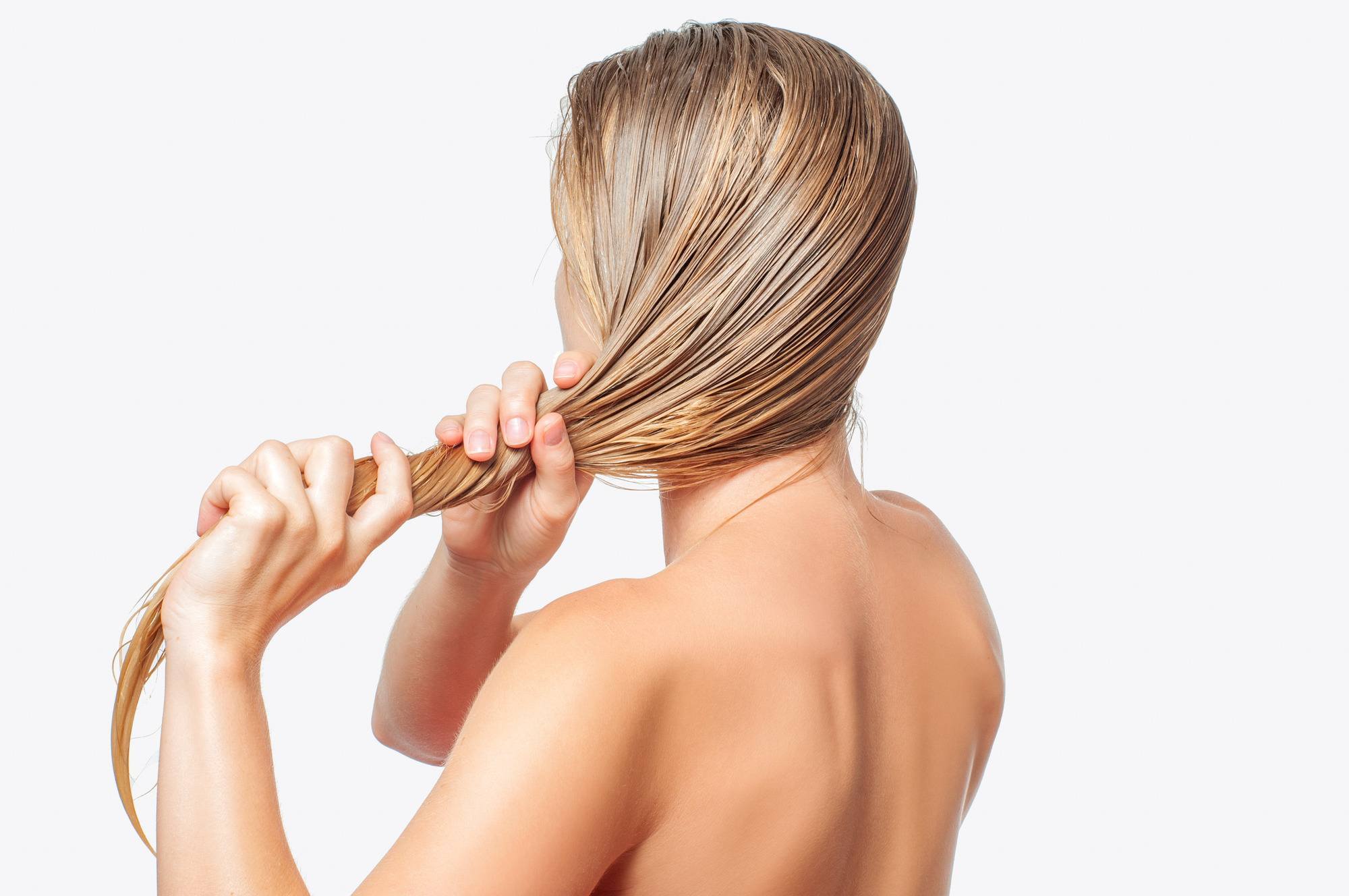 woman with wet blonde hair