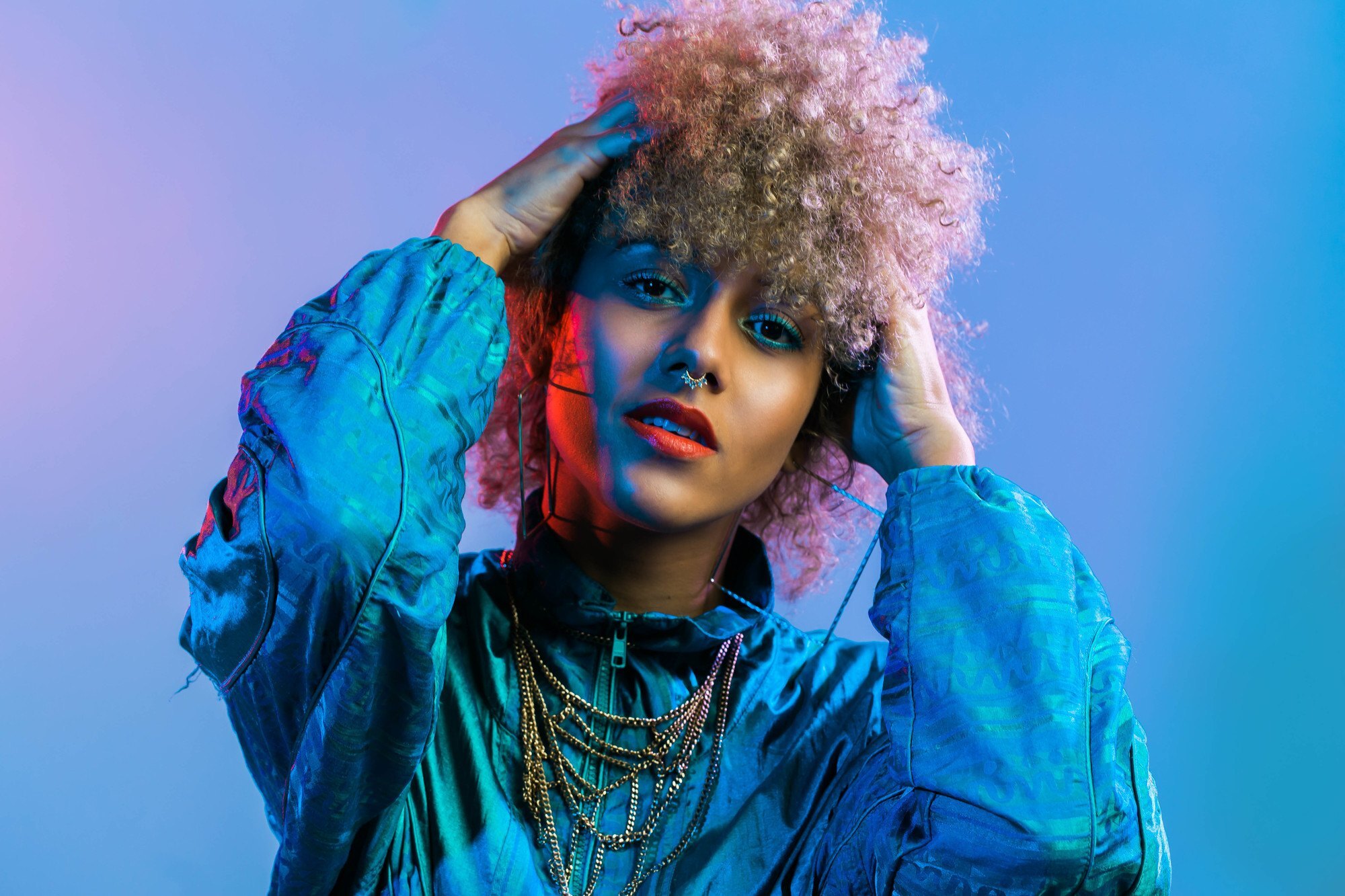 woman with dark blonde curly hair