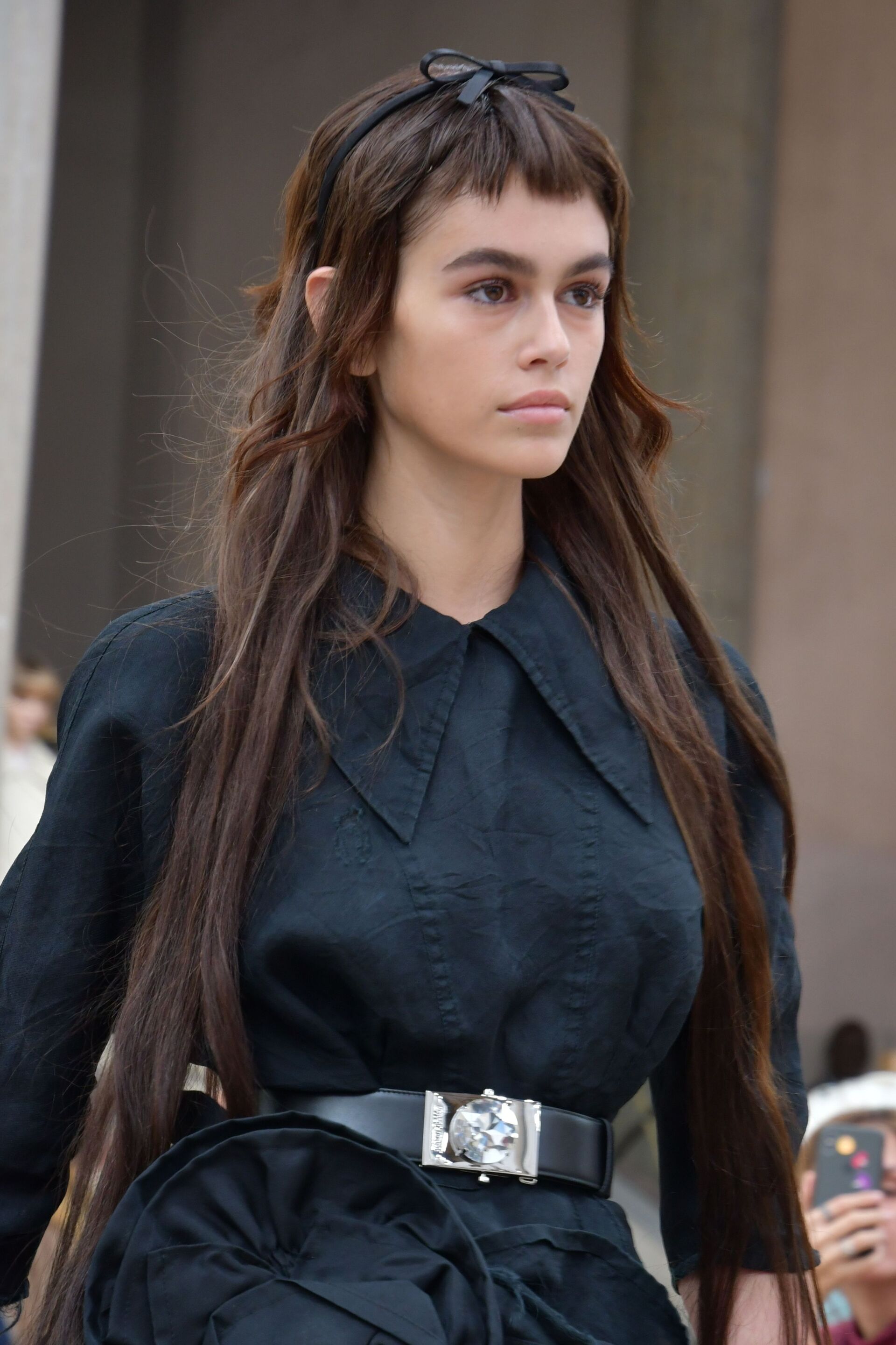 Fringe hair: Kaia Gerber with micro bangs on Miu Miu SS19 runway wearing all black
