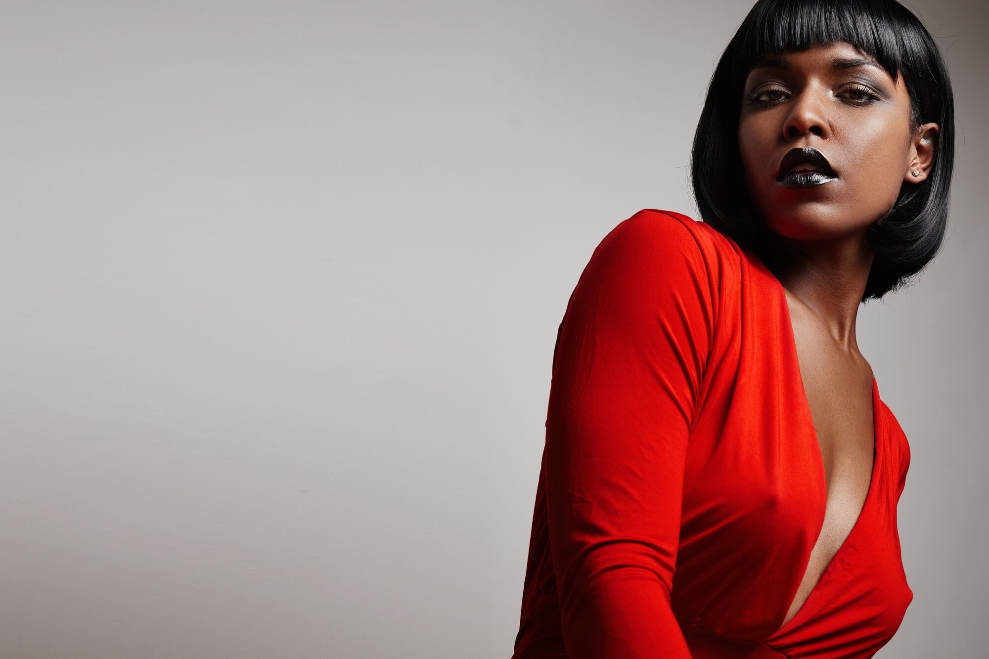 woman with bob hairstyle and fring