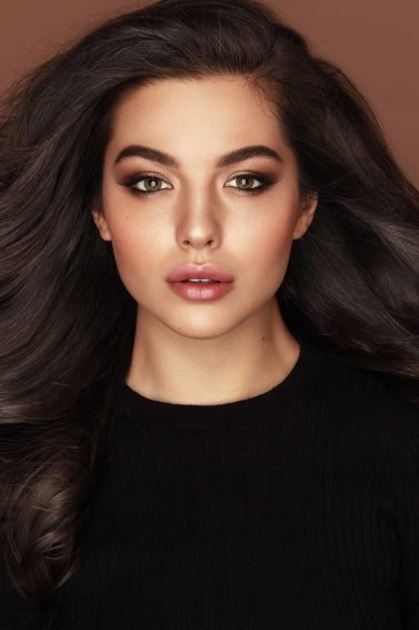 woman with long thick brown hair