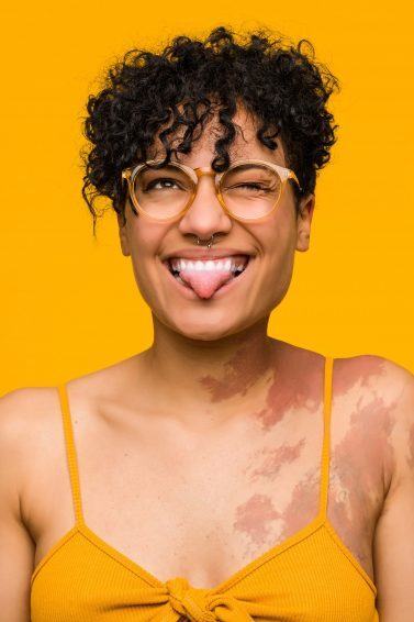 Woman with short curly pixie hairstyle