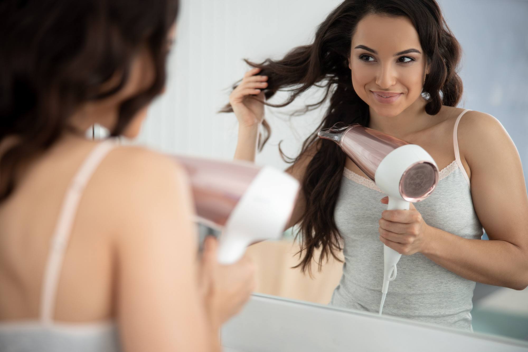 hair dryer attachments: lady blow drying hair