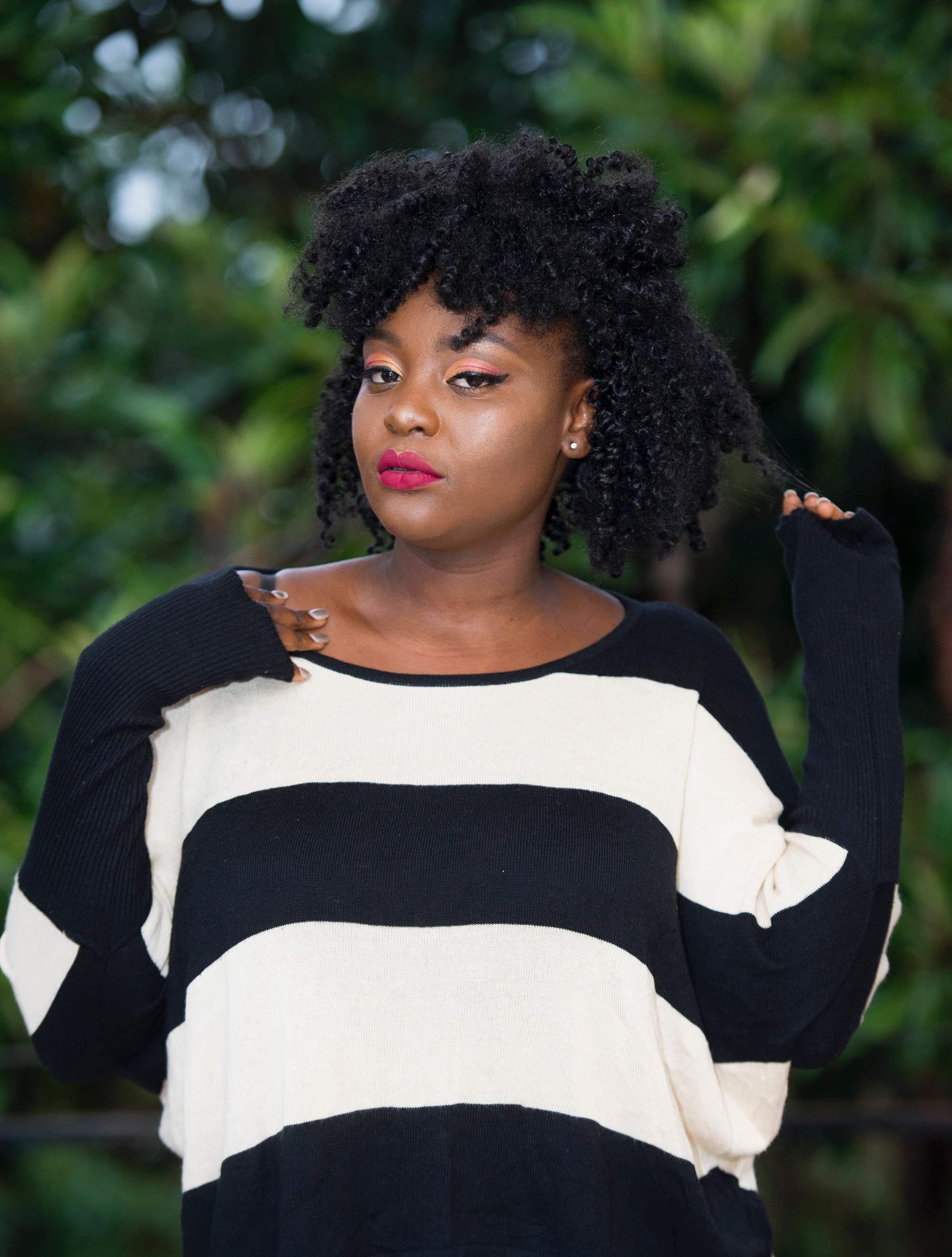 how often should you wash your hair: woman with thick curly hair