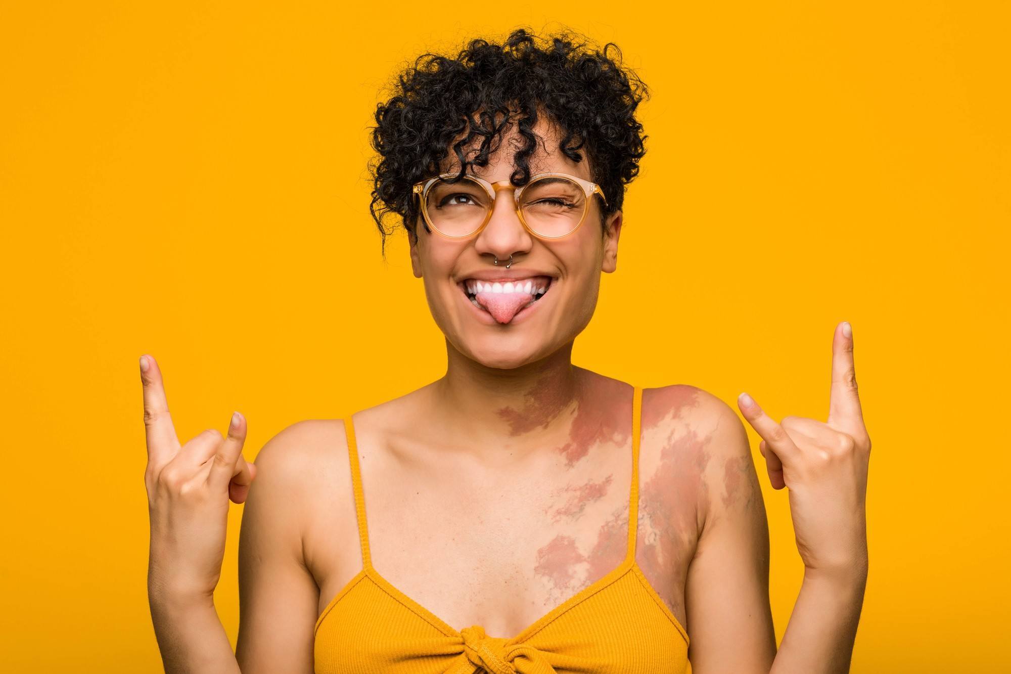 Woman with short curly pixie hairstyle