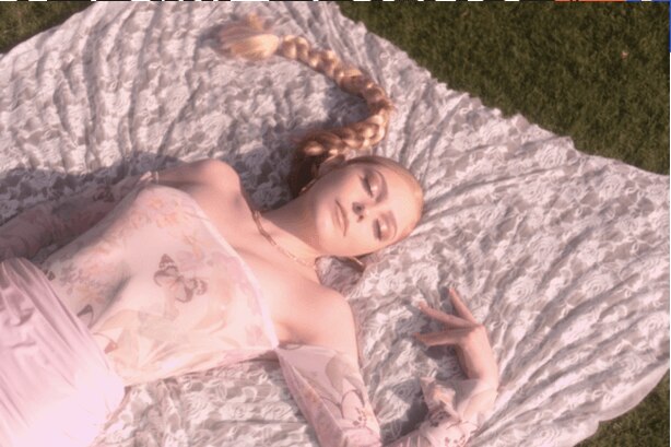 Woman wearing a sleek single braid for Galetntine's day