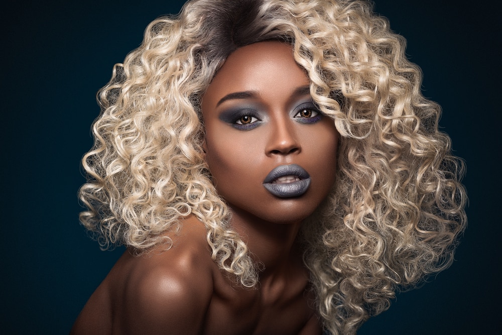 girl with blonde wig dark roots curly natural hair wig