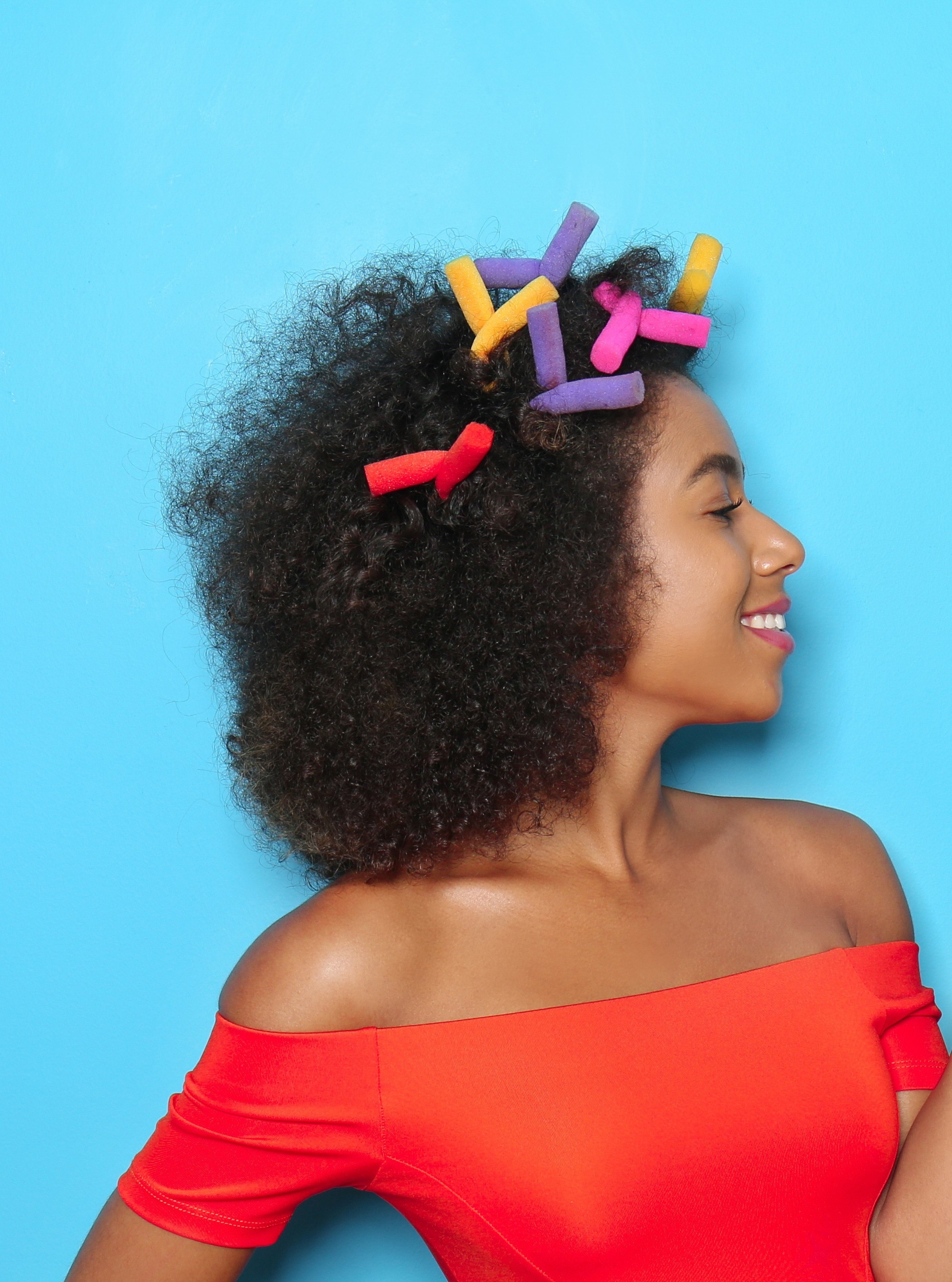 girl with rollers in her hair