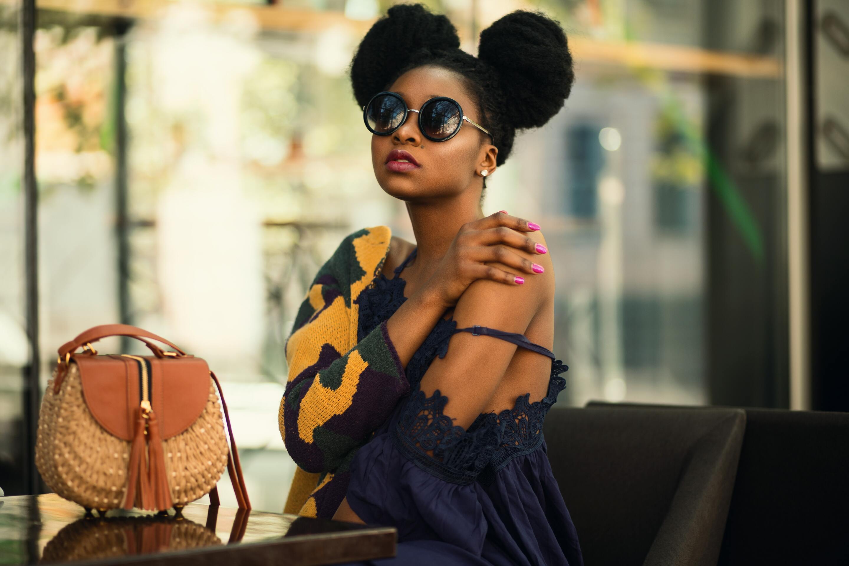girl with afro hair space buns hairstyle ideas
