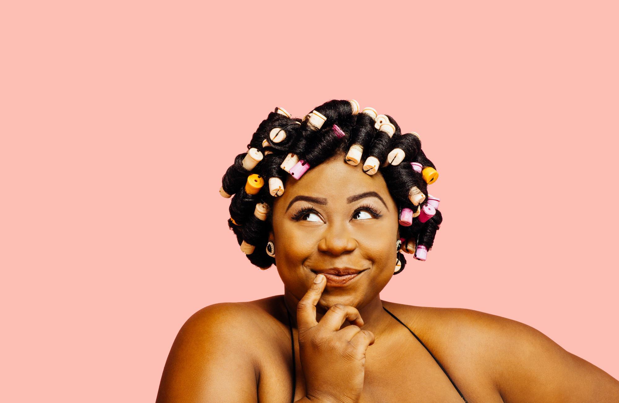 girl with rollers in her hair