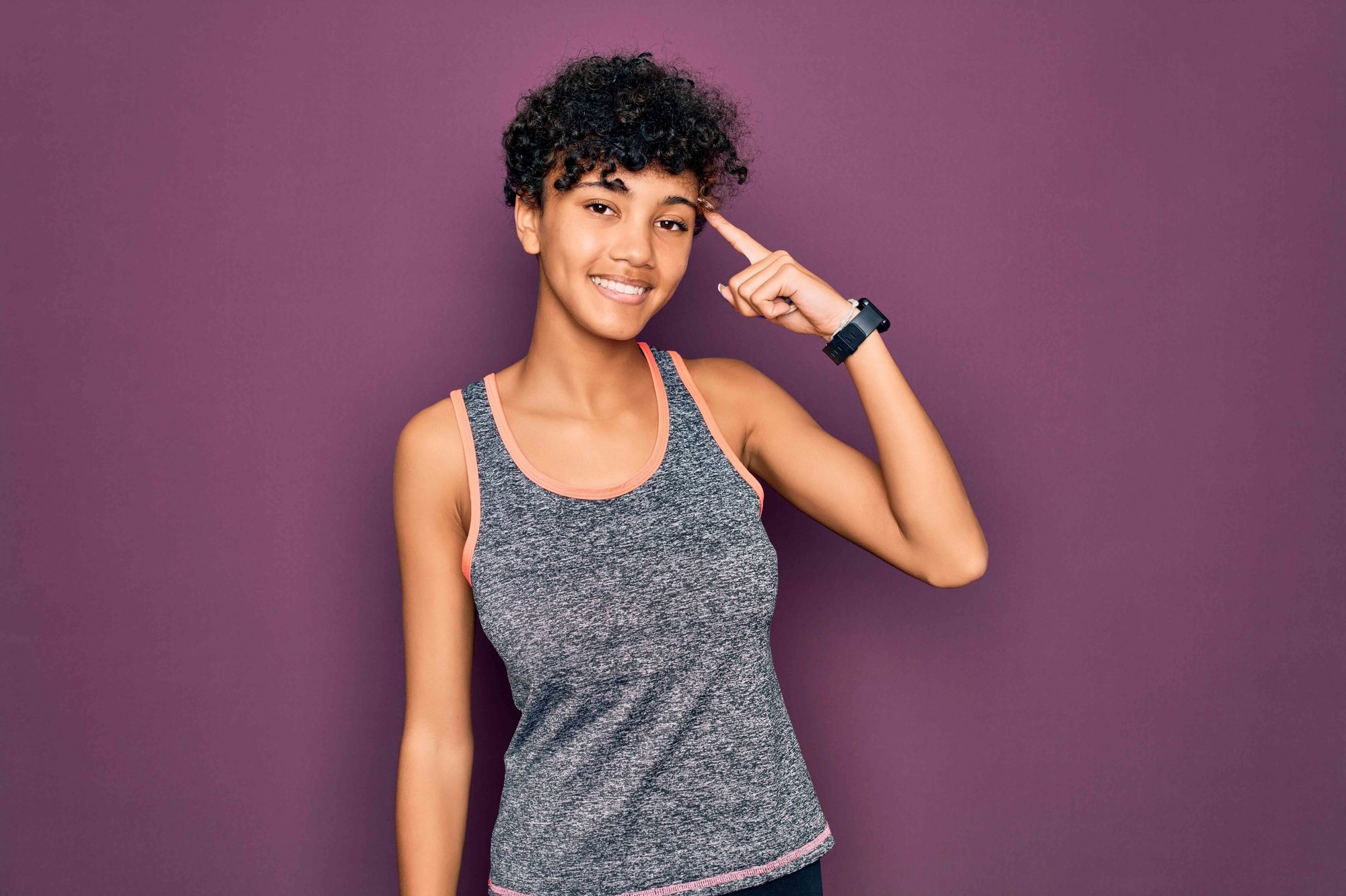 woman with curly pixie cut