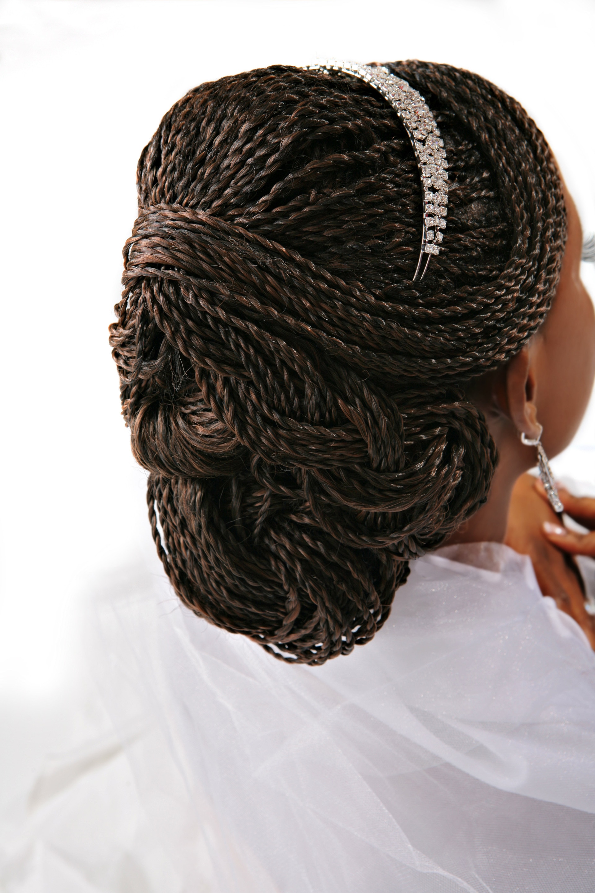 woman with micro twist updo hairstyle silver tiara accessory matric ball hairstyles wedding hairstyles