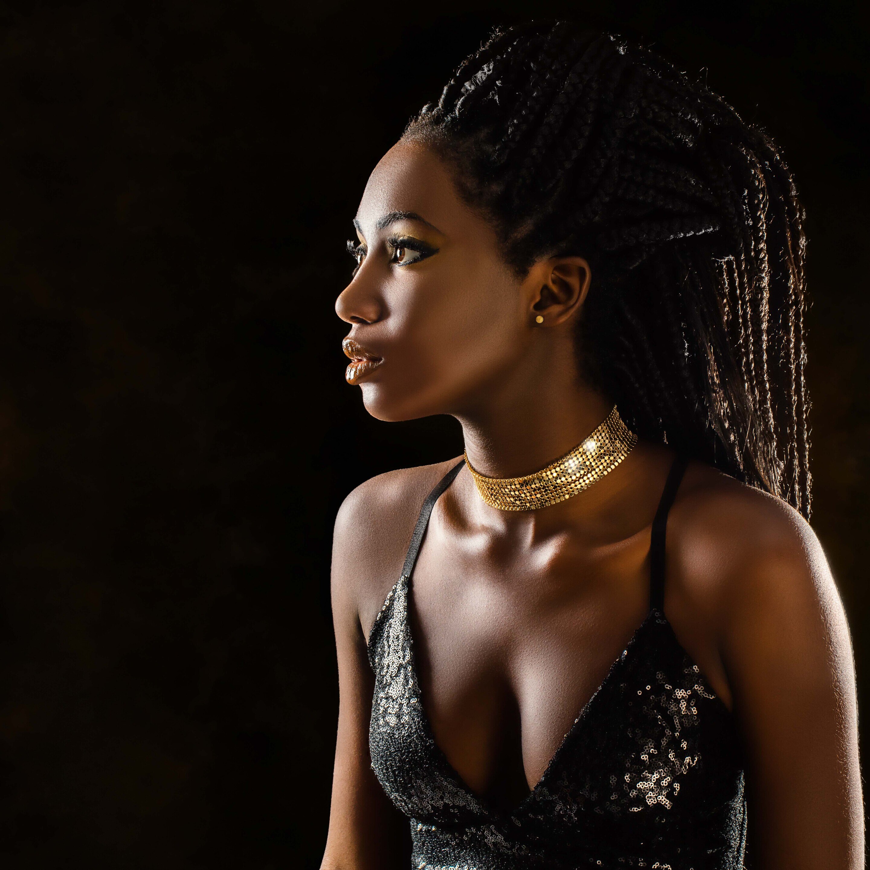 black woman long braids natural hair matric ball hairstyles