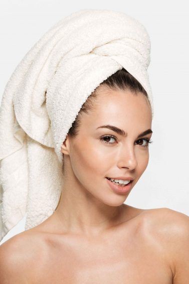 woman with a towel wrapped around her head