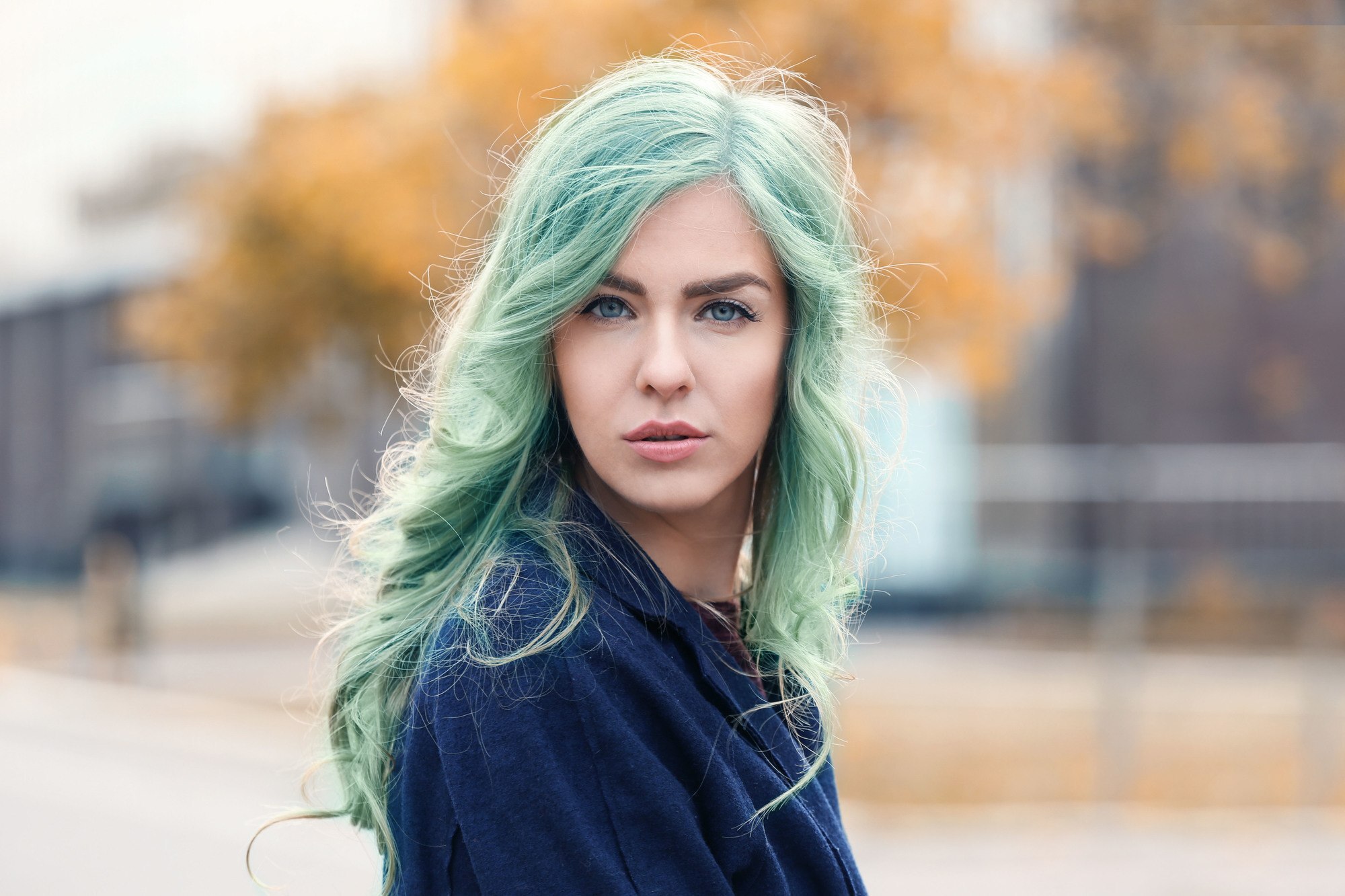 summer hair colour: woman with pastel green hair