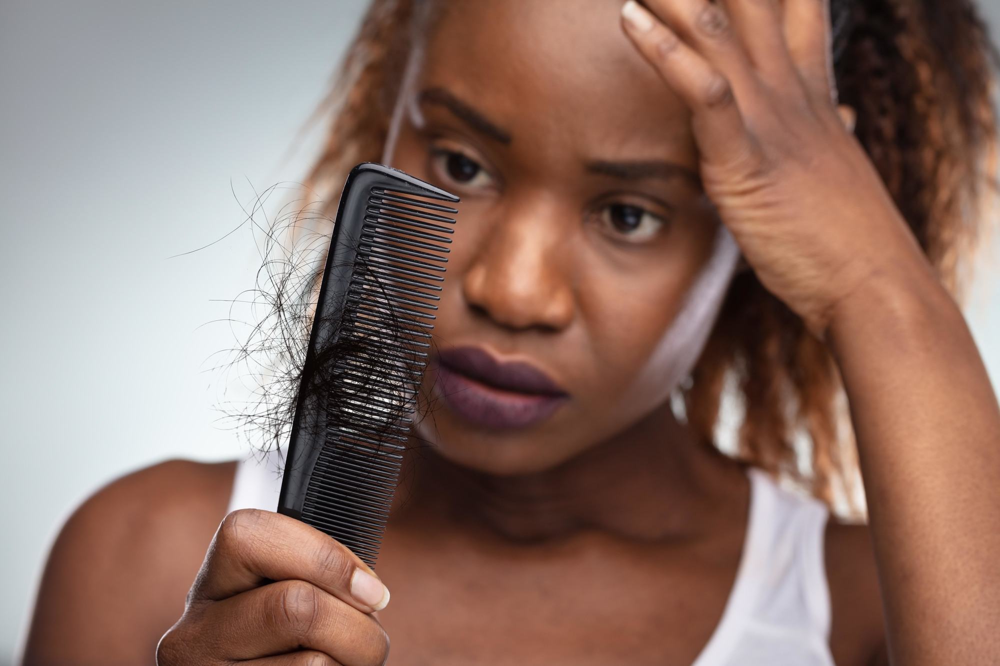 woman with hair in a comb
