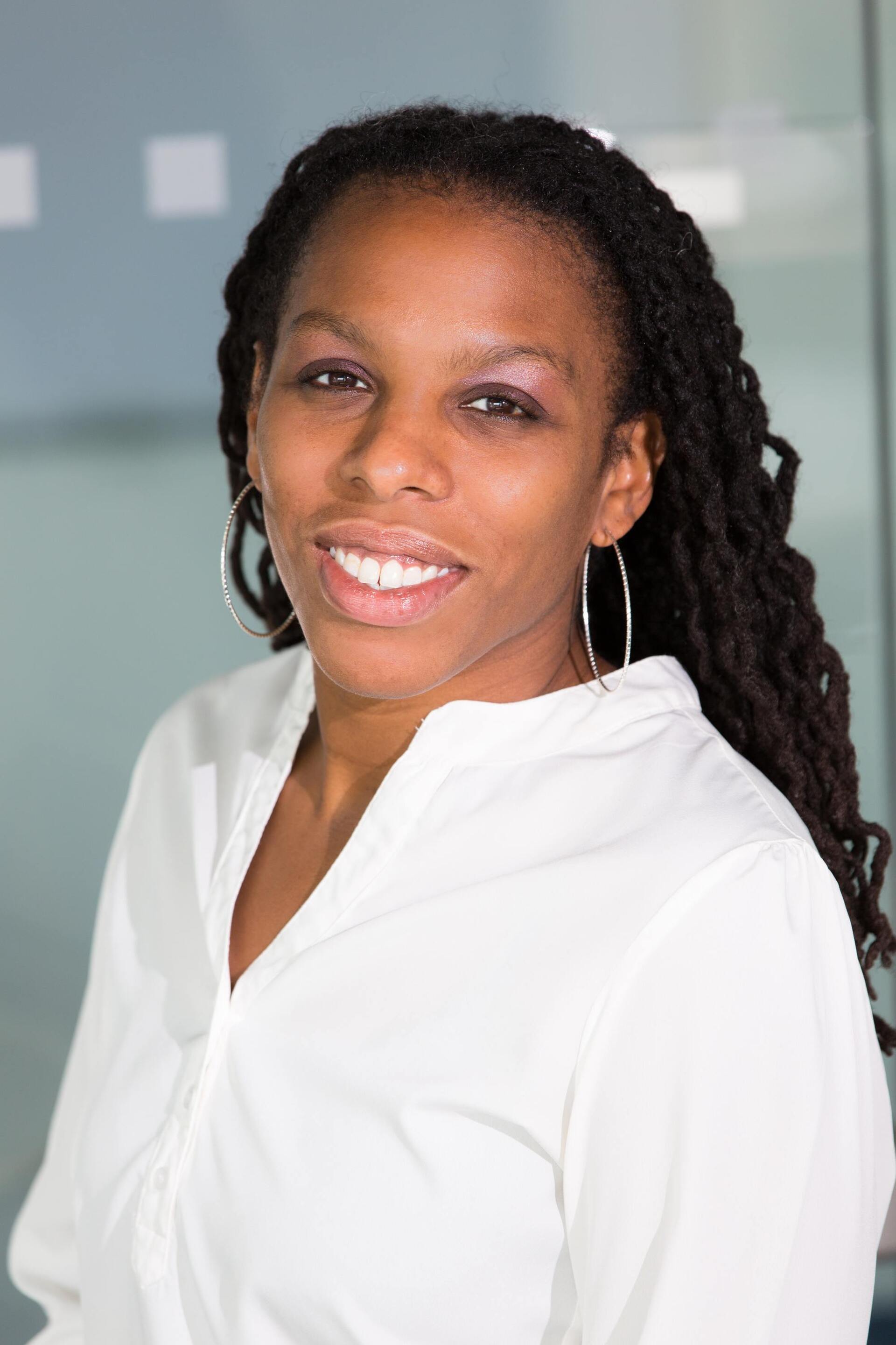 locs hairstyle: woman with long dark locs