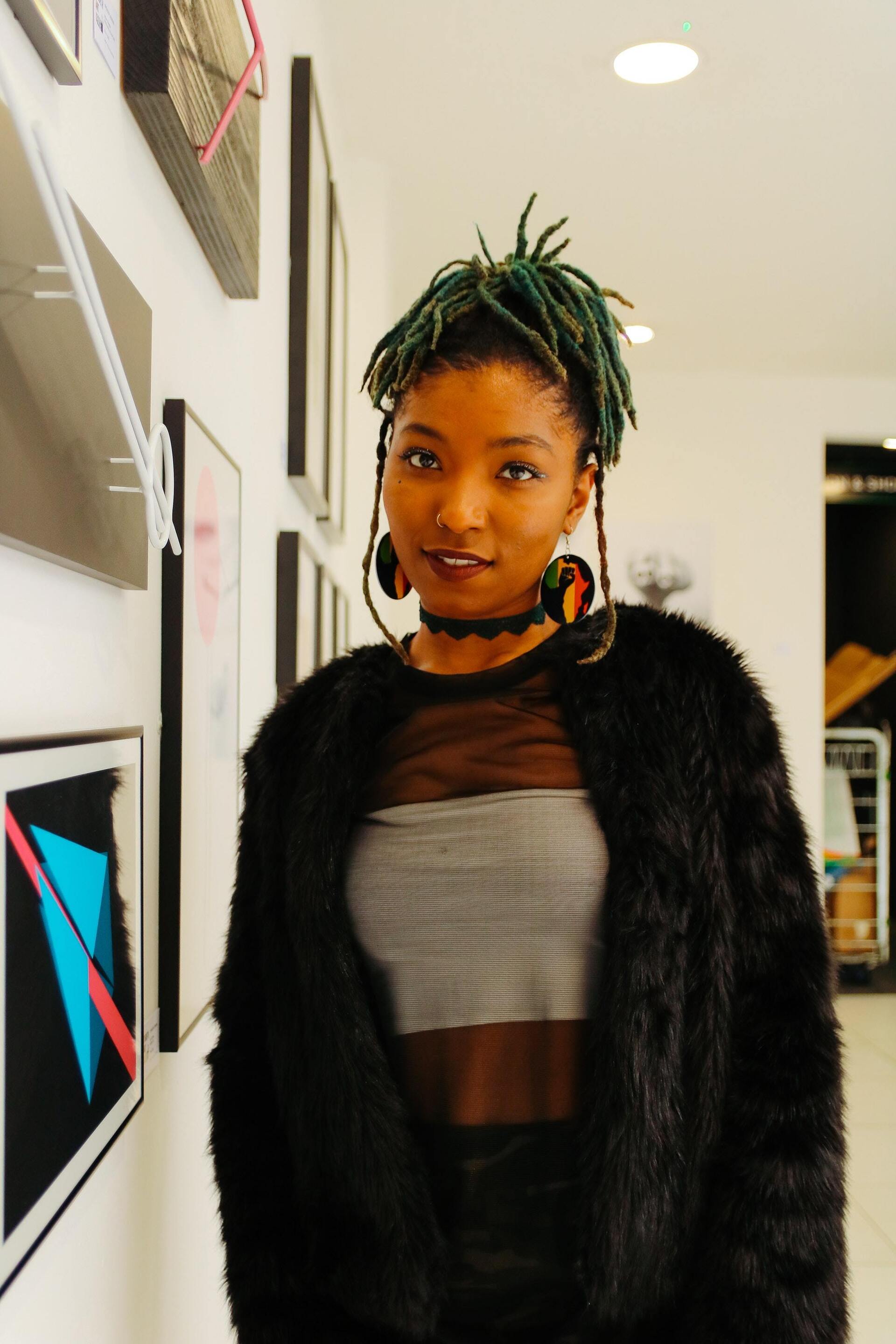 girl with green hair tied into an updo