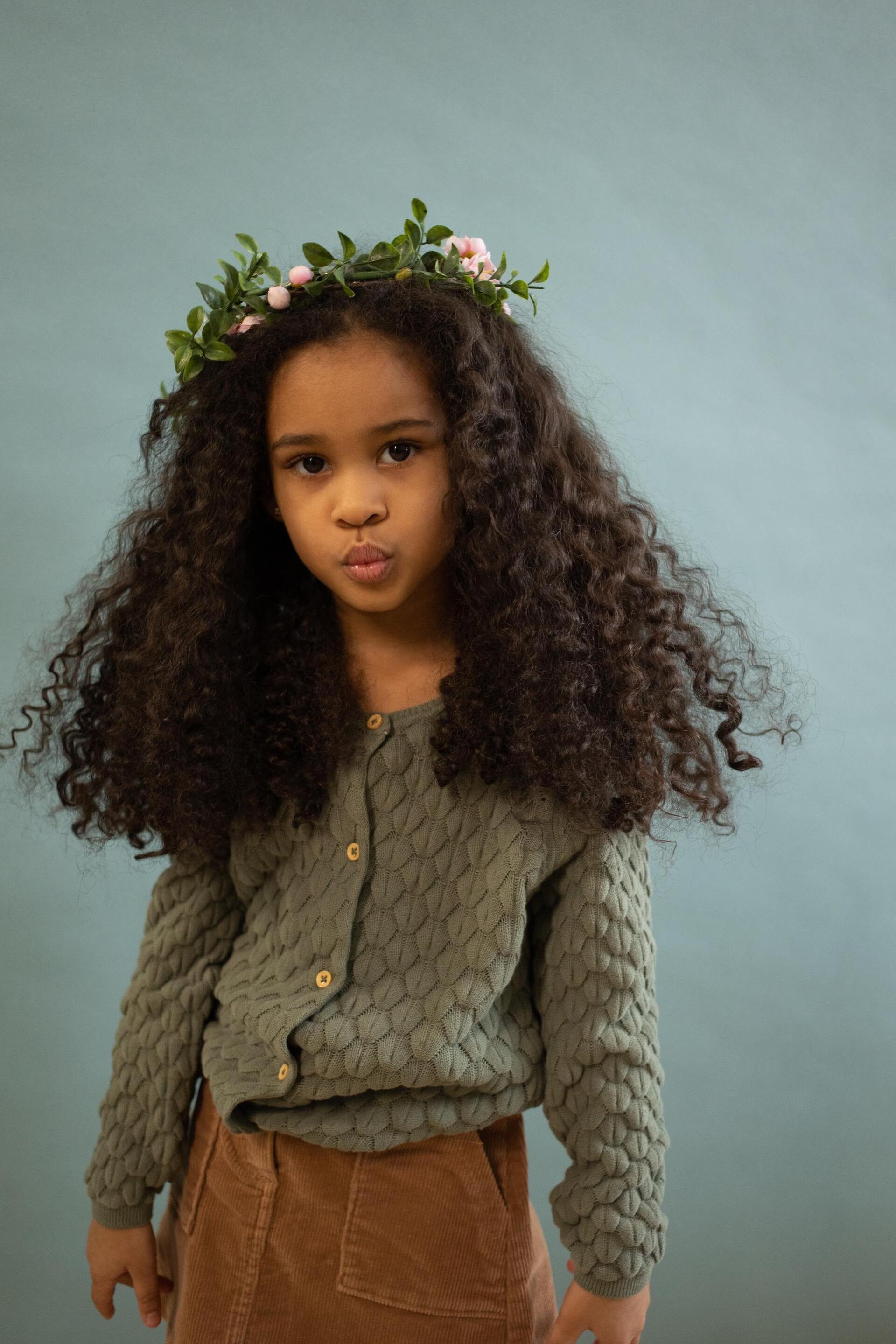 Little girl wearing a flower crown