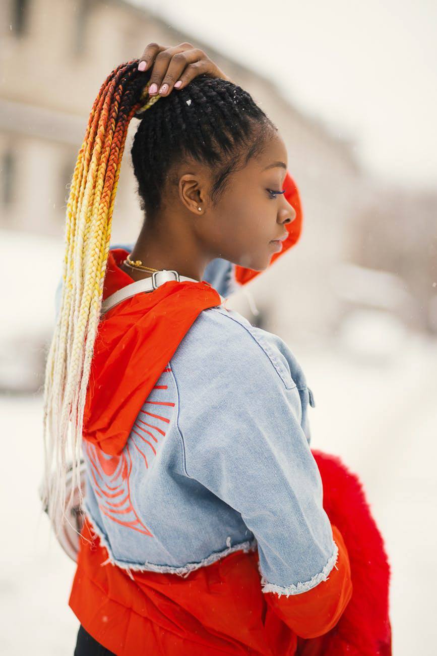 girl with box braids sunset ombre orange blonde braids