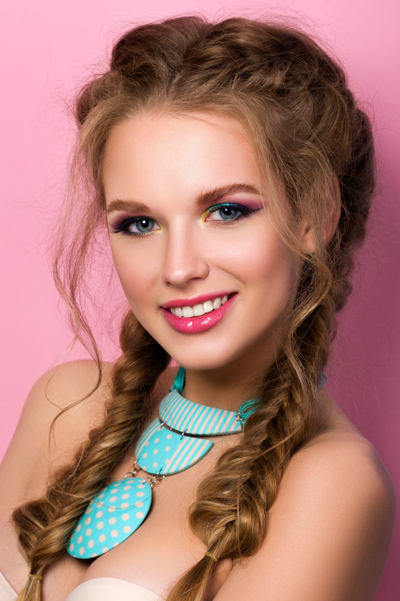 woman with double fishtail braids brown hair